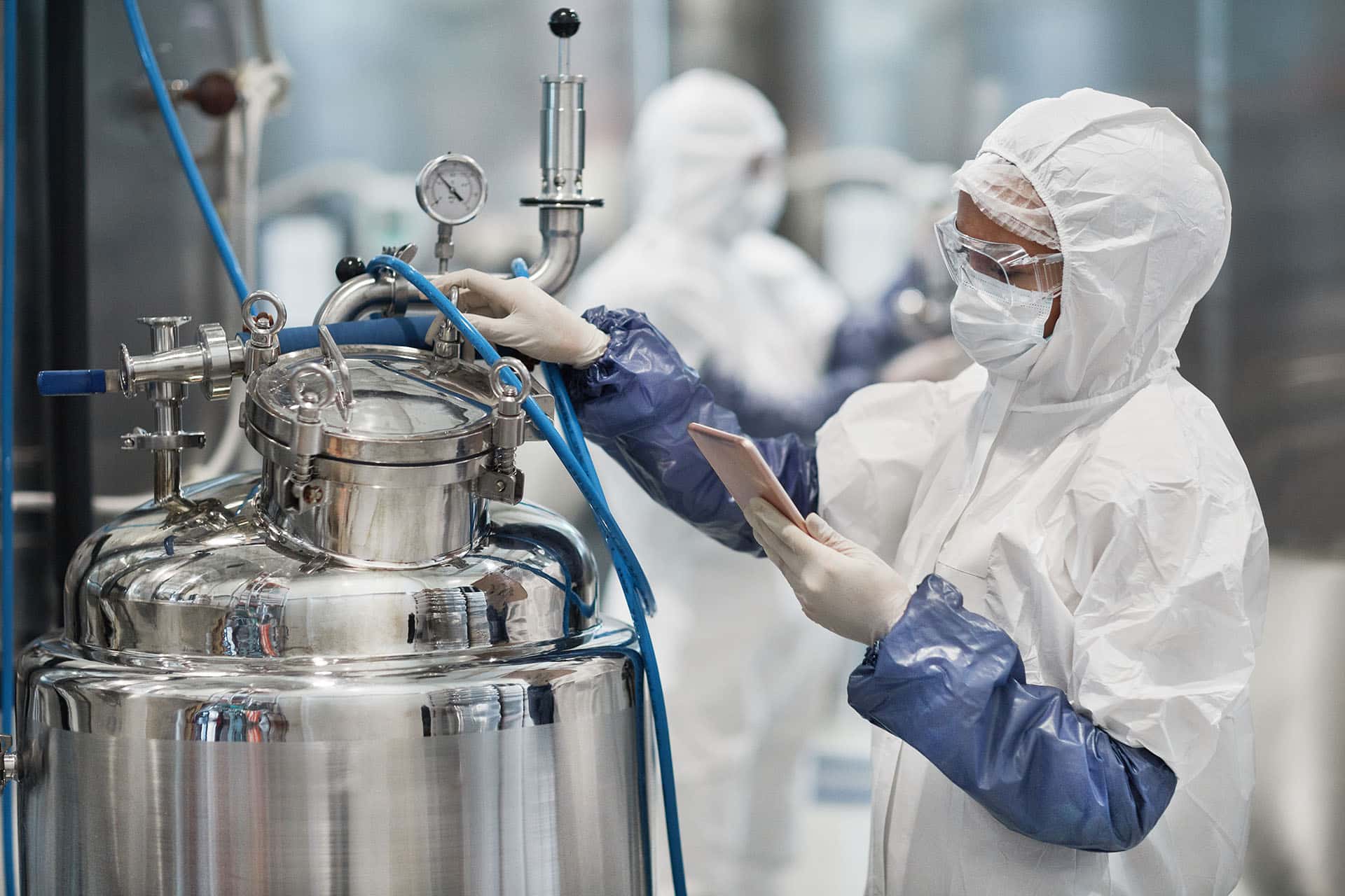 Woman operating pharmaceutical canister