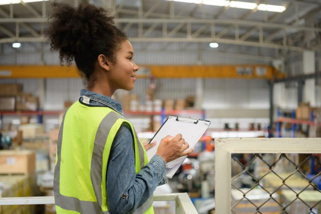 warehouse worker with industrial chillers